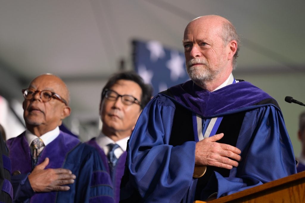 Gates, Tsai and Treanor stand with their hands over their hearts.